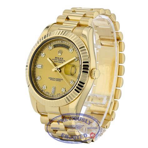 rolex day date ii president 41mm yellow gold baguette bezel